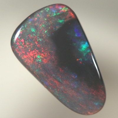 SOLID BLACK OPAL Bright red with green surrounded by black opal